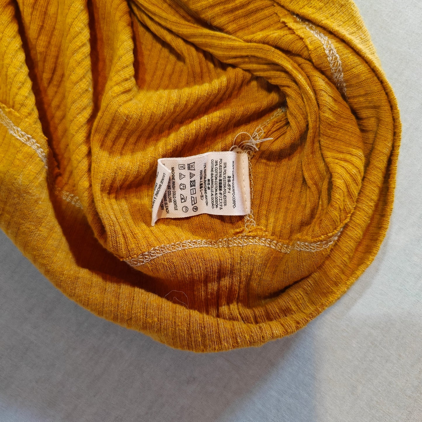Mustard Yellow Ribbed Mock Neck Sleeveless Top