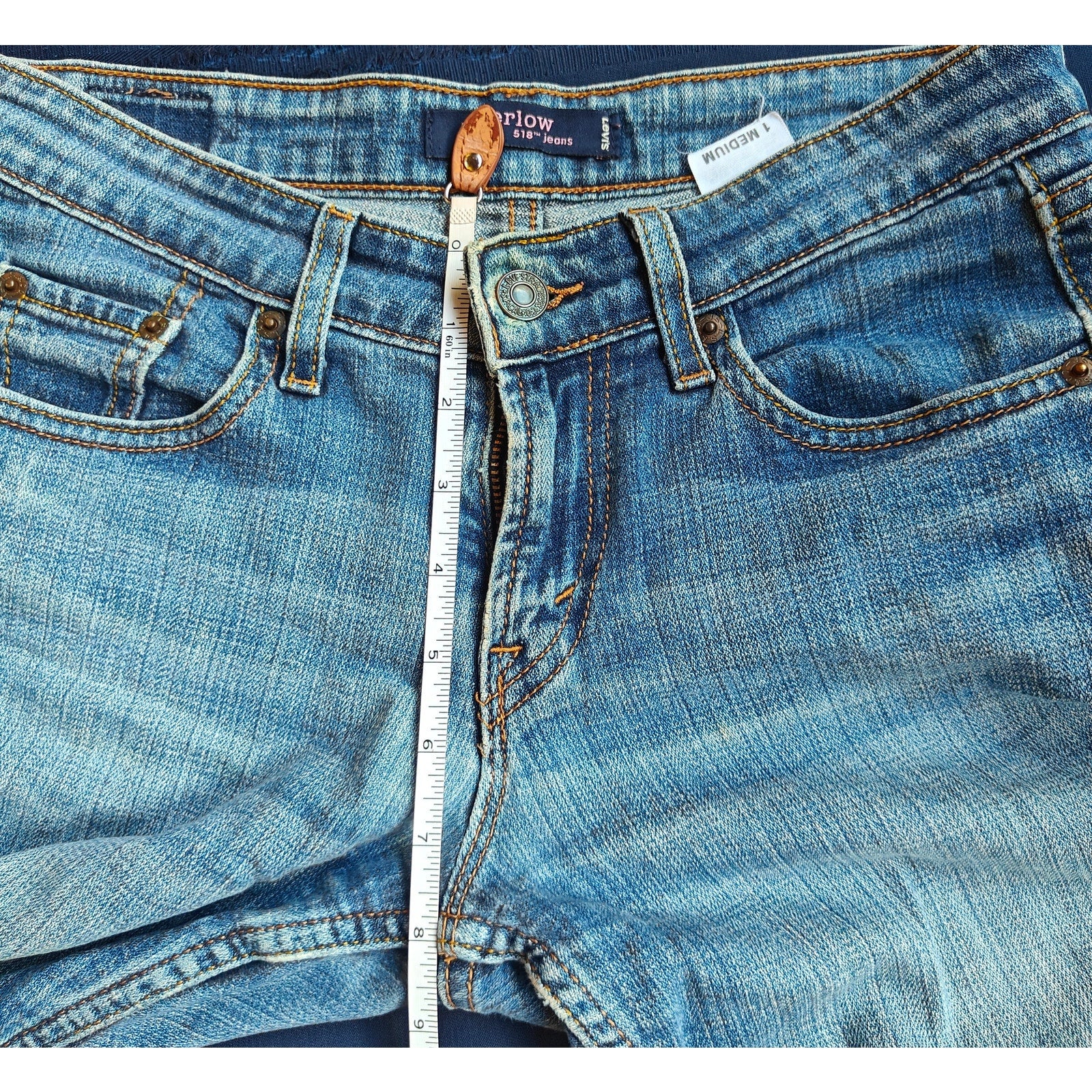518 Low Rise Medium Wash Bootcut Jeans