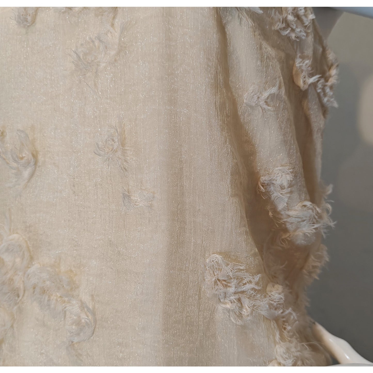 Cream Textured Sleeveless Blouse