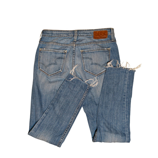 Alex Mid Rise Medium Wash Skinny Jeans
