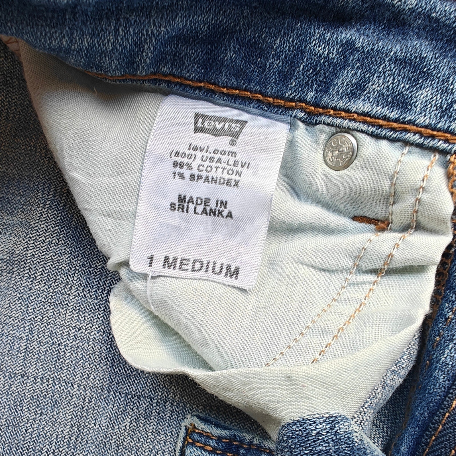518 Low Rise Medium Wash Bootcut Jeans