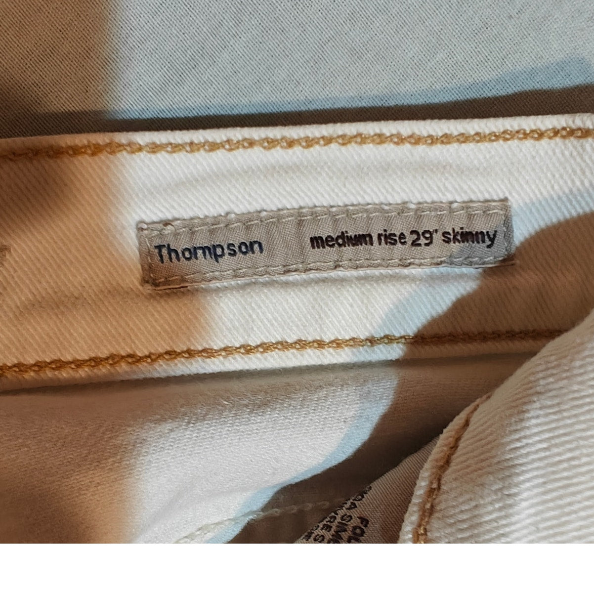 White Thompson Medium Rise Skinny Jeans