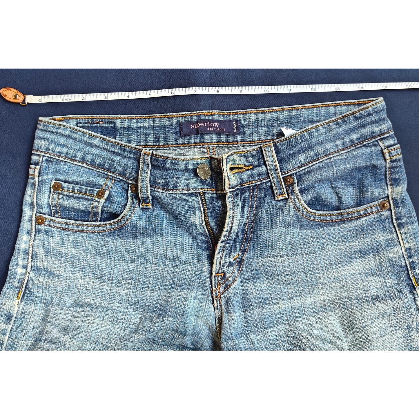 518 Low Rise Medium Wash Bootcut Jeans
