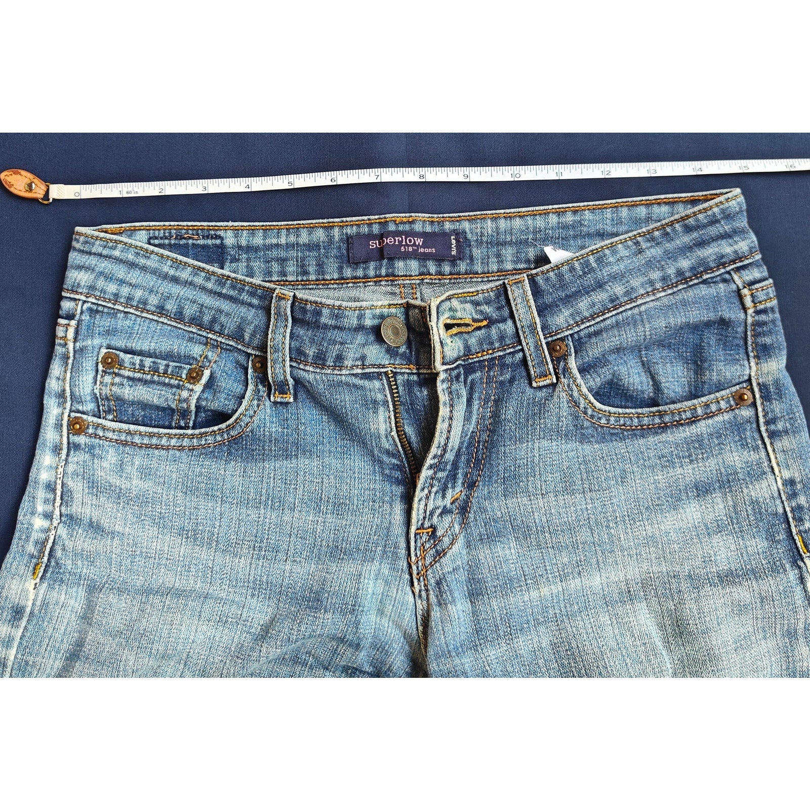 518 Low Rise Medium Wash Bootcut Jeans