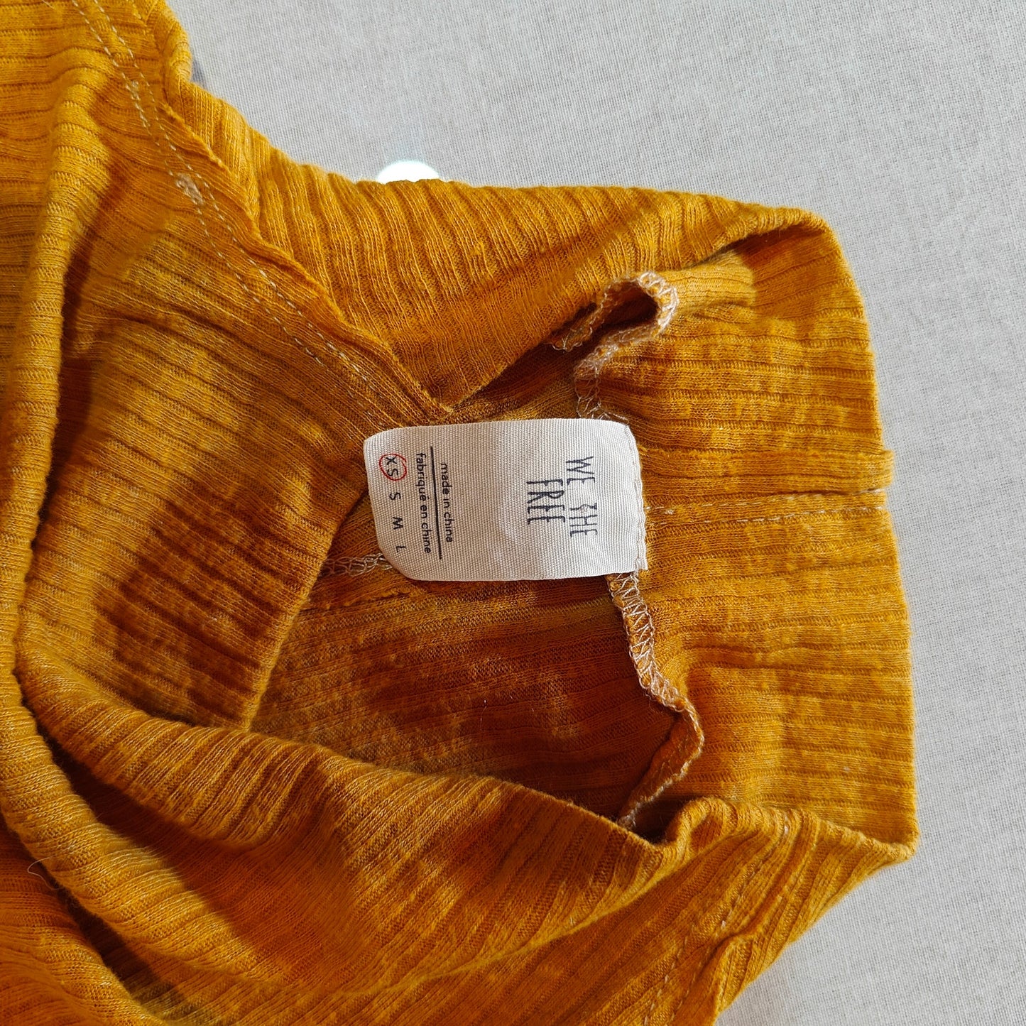 Mustard Yellow Ribbed Mock Neck Sleeveless Top