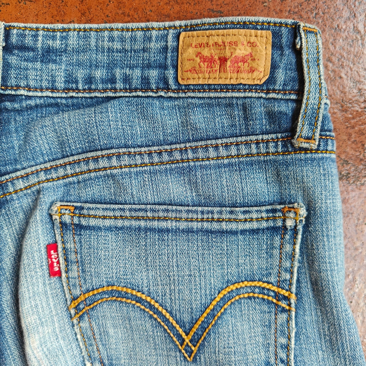 518 Low Rise Medium Wash Bootcut Jeans