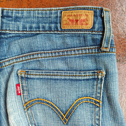 518 Low Rise Medium Wash Bootcut Jeans
