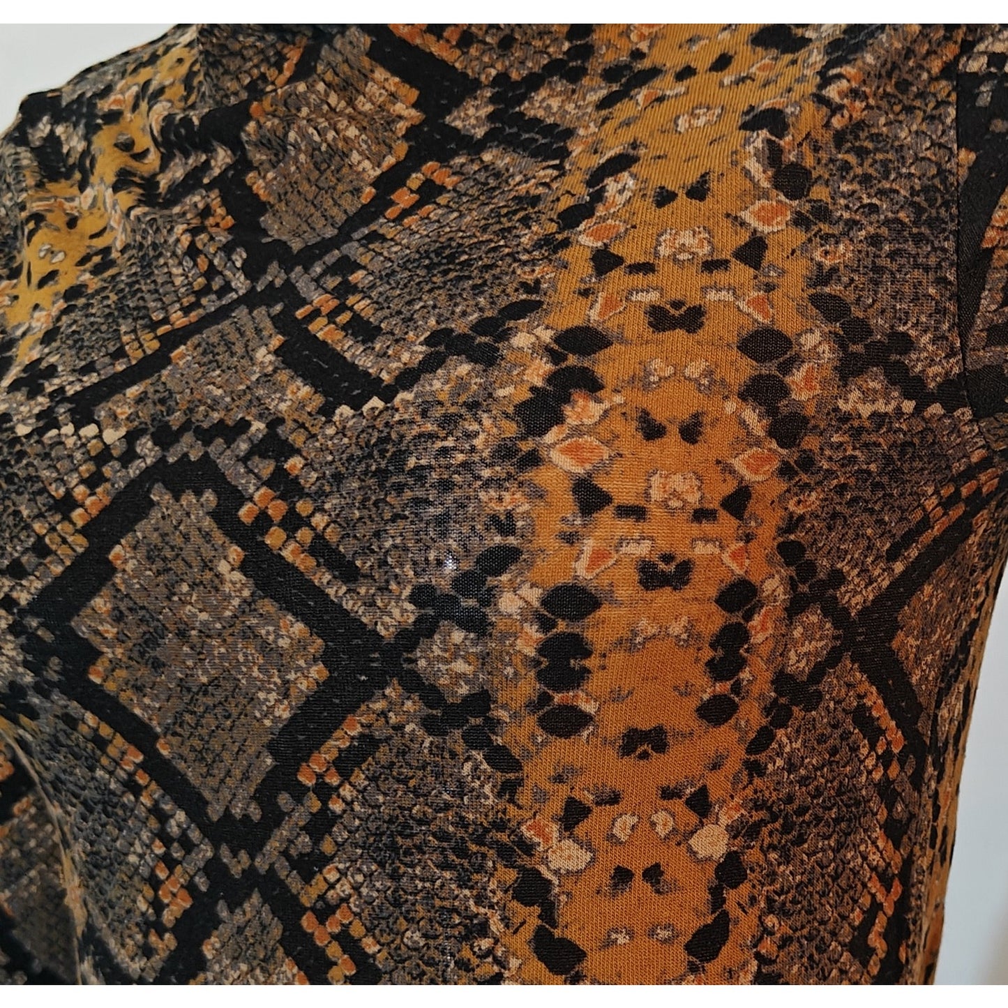 Snake Print Turtleneck Top