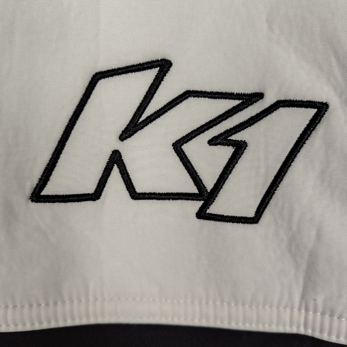 K1 Speed Racing Black & White Softshell Jacket – Men’s Medium
