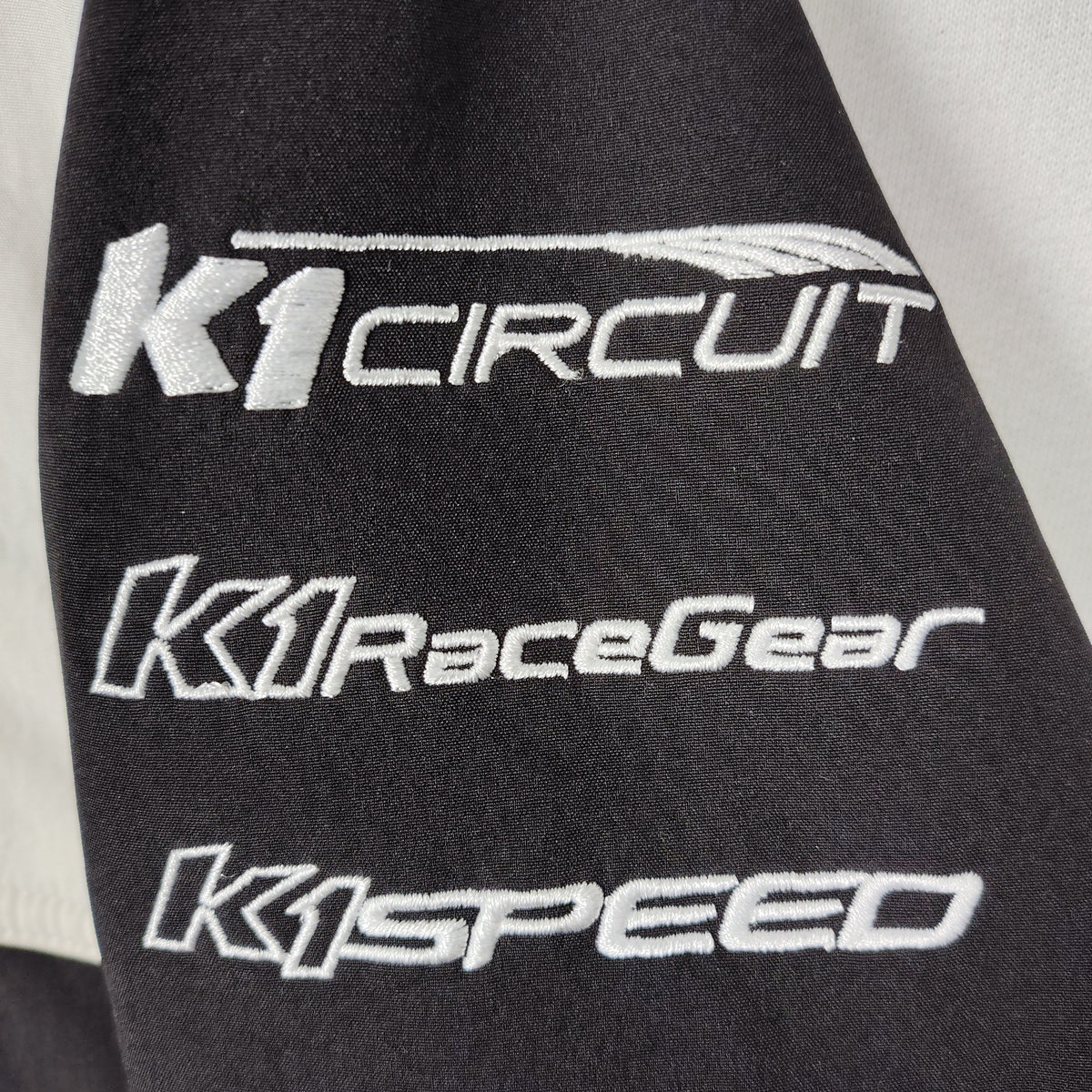K1 Speed Racing Black & White Softshell Jacket – Men’s Medium