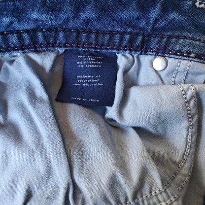 Chelsea Mid Rise Skinny Jeans