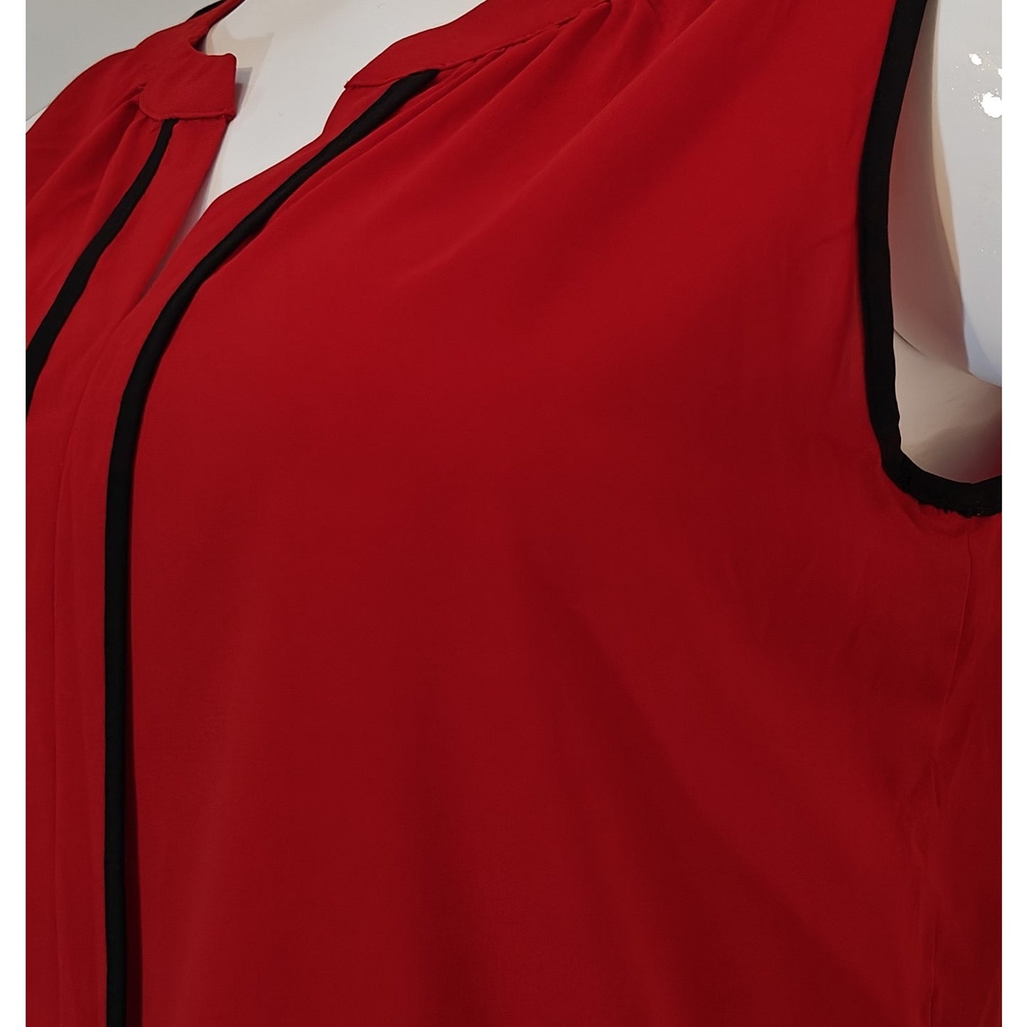 Red Sleeveless Blouse with Black Trim