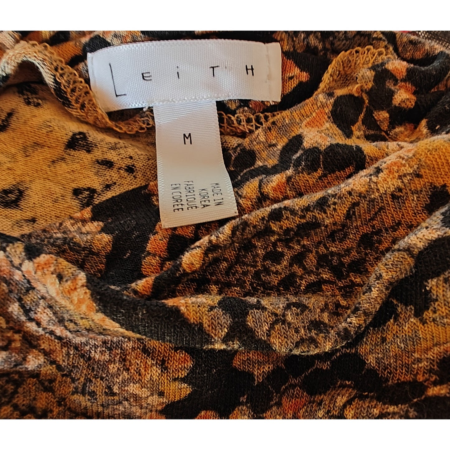 Snake Print Turtleneck Top