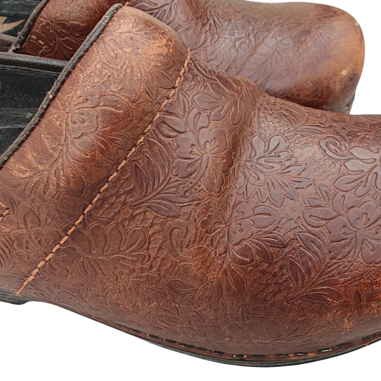 Brown Tooled Leather Clogs With Floral Detail